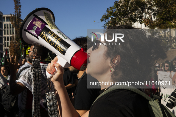 A person chants during a pro-Palestinian rally as part of an international day of action near the White House in Washington DC, USA, on Octo...