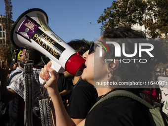 A person chants during a pro-Palestinian rally as part of an international day of action near the White House in Washington DC, USA, on Octo...