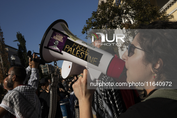 A person chants during a pro-Palestinian rally as part of an international day of action near the White House in Washington DC, USA, on Octo...