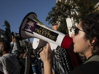 A person chants during a pro-Palestinian rally as part of an international day of action near the White House in Washington DC, USA, on Octo...