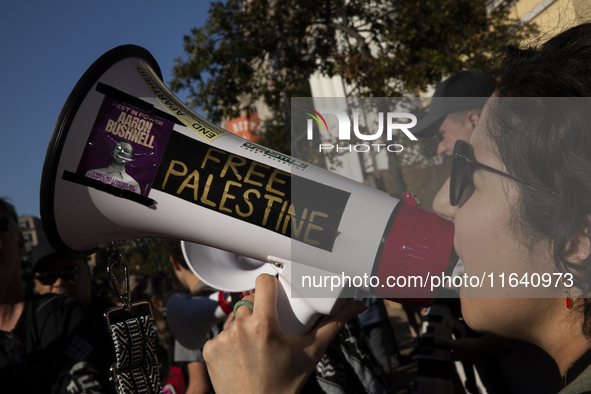 A person chants during a pro-Palestinian rally as part of an international day of action near the White House in Washington DC, USA, on Octo...