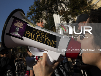 A person chants during a pro-Palestinian rally as part of an international day of action near the White House in Washington DC, USA, on Octo...