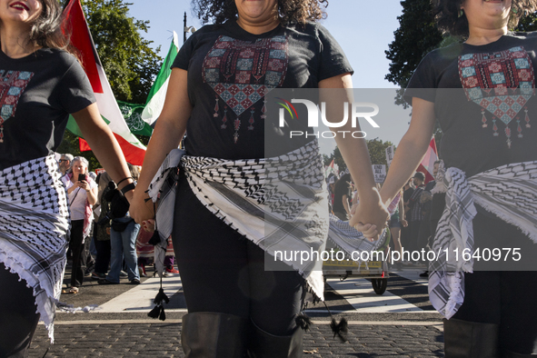 Hundreds gather during a pro-Palestinian rally as part of an international day of action near the White House in Washington DC, USA, on Octo...