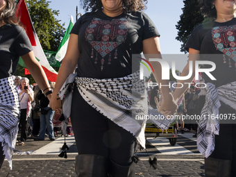 Hundreds gather during a pro-Palestinian rally as part of an international day of action near the White House in Washington DC, USA, on Octo...