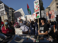 Hundreds gather during a pro-Palestinian rally as part of an international day of action near the White House in Washington DC, USA, on Octo...