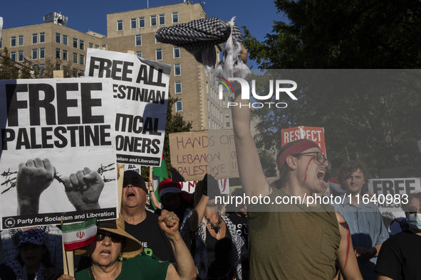 Hundreds gather during a pro-Palestinian rally as part of an international day of action near the White House in Washington DC, USA, on Octo...