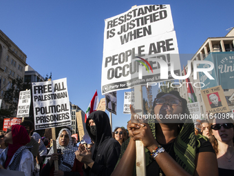 Hundreds gather during a pro-Palestinian rally as part of an international day of action near the White House in Washington DC, USA, on Octo...