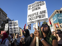 Hundreds gather during a pro-Palestinian rally as part of an international day of action near the White House in Washington DC, USA, on Octo...