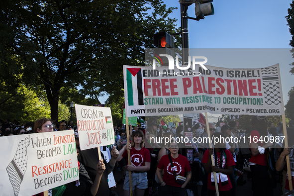 Hundreds gather during a pro-Palestinian rally as part of an international day of action near the White House in Washington DC, USA, on Octo...