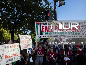 Hundreds gather during a pro-Palestinian rally as part of an international day of action near the White House in Washington DC, USA, on Octo...