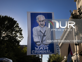 A large picture of Israeli Prime Minister Benjamin Netanyahu displays the text ''War Criminal'' during a pro-Palestinian rally as part of an...