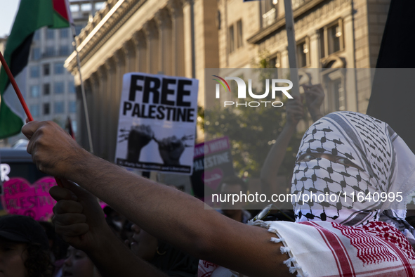 A person chants during a pro-Palestinian rally as part of an international day of action near the White House in Washington DC, USA, on Octo...