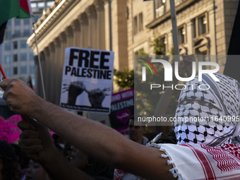 A person chants during a pro-Palestinian rally as part of an international day of action near the White House in Washington DC, USA, on Octo...