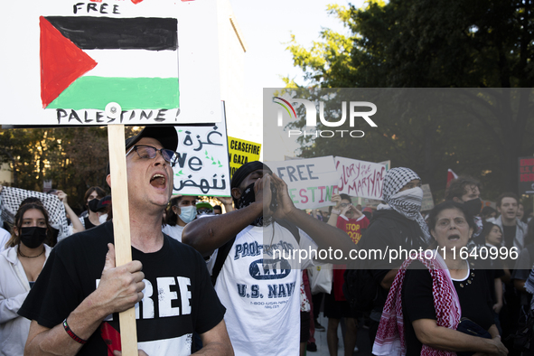 Demonstrators chant during a pro-Palestinian rally as part of an international day of action near the White House in Washington DC, USA, on...