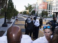 A demonstrator is arrested by police during a pro-Palestinian rally as part of an international day of action near the White House in Washin...