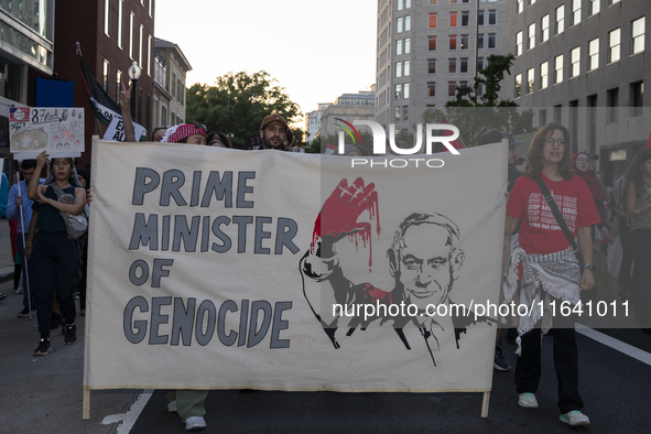 Hundreds gather during a pro-Palestinian rally as part of an international day of action near the White House in Washington DC, USA, on Octo...