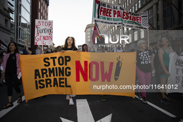 Hundreds gather during a pro-Palestinian rally as part of an international day of action near the White House in Washington DC, USA, on Octo...