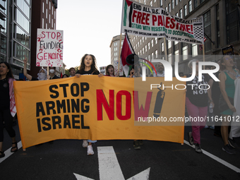 Hundreds gather during a pro-Palestinian rally as part of an international day of action near the White House in Washington DC, USA, on Octo...