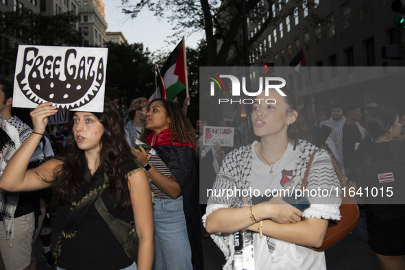 Hundreds gather during a pro-Palestinian rally as part of an international day of action near the White House in Washington DC, USA, on Octo...