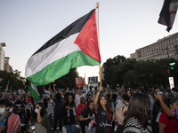 Hundreds gather during a pro-Palestinian rally as part of an international day of action near the White House in Washington DC, USA, on Octo...