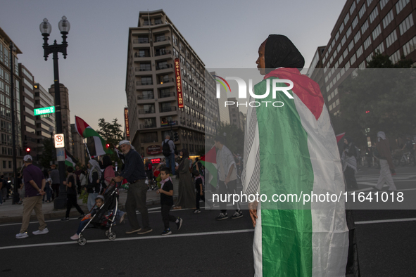 Hundreds gather during a pro-Palestinian rally as part of an international day of action near the White House in Washington DC, USA, on Octo...