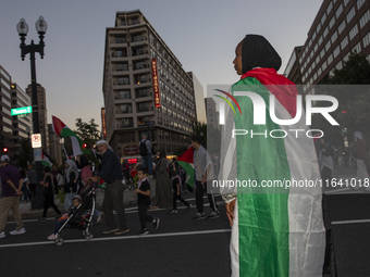 Hundreds gather during a pro-Palestinian rally as part of an international day of action near the White House in Washington DC, USA, on Octo...