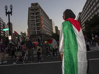 Hundreds gather during a pro-Palestinian rally as part of an international day of action near the White House in Washington DC, USA, on Octo...