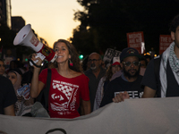 A demonstrator chants during a pro-Palestinian rally as part of an international day of action near the White House in Washington DC, USA, o...