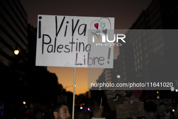 A sign with the text ''Viva Palestina Libre'' is seen during a pro-Palestinian rally as part of an international day of action near the Whit...