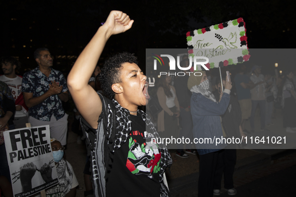 A demonstrator chants during a pro-Palestinian rally as part of an international day of action near the White House in Washington DC, USA, o...