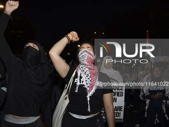 Demonstrators chant during a pro-Palestinian rally as part of an international day of action near the White House in Washington DC, USA, on...