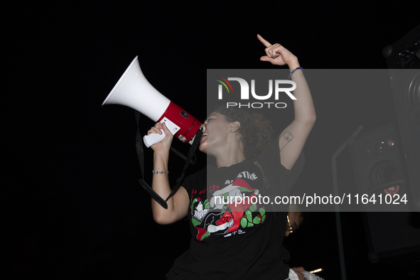 A demonstrator chants during a pro-Palestinian rally as part of an international day of action near the White House in Washington DC, USA, o...