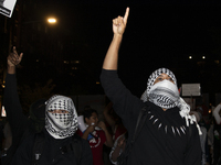 Demonstrators chant during a pro-Palestinian rally as part of an international day of action near the White House in Washington DC, USA, on...