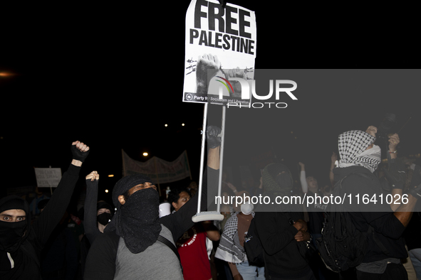 A demonstrator chants during a pro-Palestinian rally as part of an international day of action near the White House in Washington DC, USA, o...