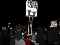 A demonstrator chants during a pro-Palestinian rally as part of an international day of action near the White House in Washington DC, USA, o...