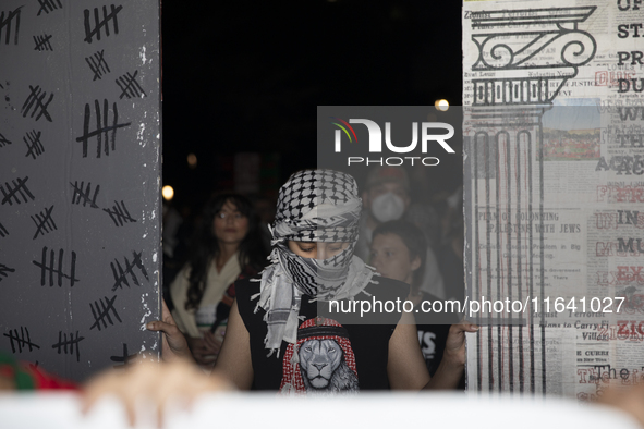 Hundreds gather during a pro-Palestinian rally as part of an international day of action near the White House in Washington DC, USA, on Octo...