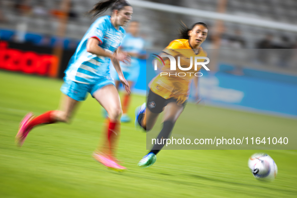 Chicago Red Stars midfielder Taylor Malham (32) and Houston Dash midfielder Barbara Olivieri (15) chase the ball during a match between Hous...