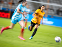 Chicago Red Stars midfielder Taylor Malham (32) and Houston Dash midfielder Barbara Olivieri (15) chase the ball during a match between Hous...