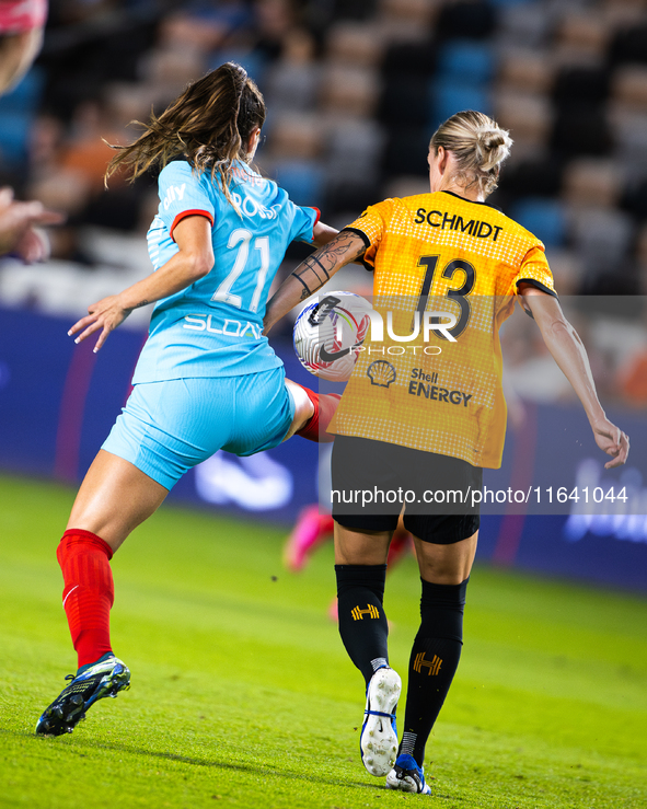 Chicago Red Stars midfielder Julia Grosso (21) and Houston Dynamo midfielder Sophie Schmidt (13) battle for the ball during a match between...