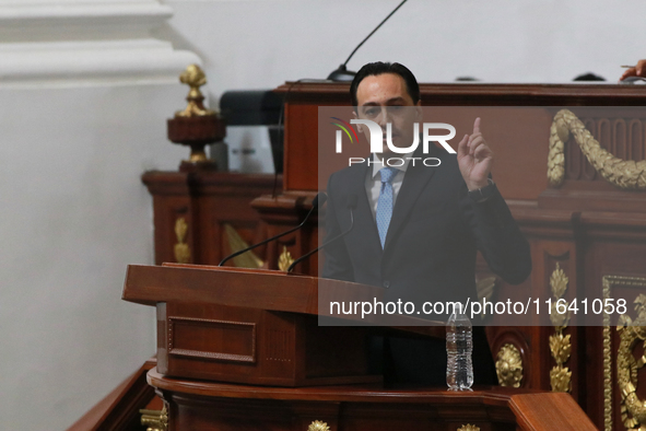 Deputy Andres Atayde Rubiolo of the National Action Party (PAN) speaks during the solemn session in which Clara Brugada takes office as head...