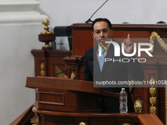 Deputy Andres Atayde Rubiolo of the National Action Party (PAN) speaks during the solemn session in which Clara Brugada takes office as head...