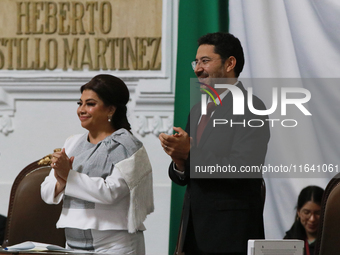 Clara Brugada, Head of Government of Mexico City, is accompanied by former Head of Government of Mexico City, Marti Batres, during the solem...