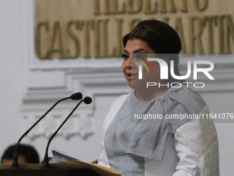 Clara Brugada Molina speaks during the solemn session in which she takes office as Head of Government of Mexico City, held at the Congress o...