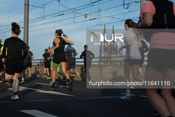 Thousands of people take part in the traditional Cologne Marathon in Cologne, Germany, on October 6, 2024. 