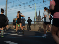 Thousands of people take part in the traditional Cologne Marathon in Cologne, Germany, on October 6, 2024. (