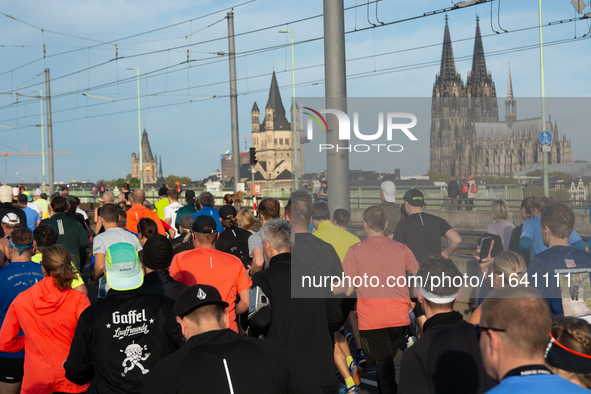 Thousands of people take part in the traditional Cologne Marathon in Cologne, Germany, on October 6, 2024. 