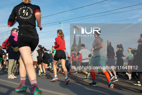 Thousands of people take part in the traditional Cologne Marathon in Cologne, Germany, on October 6, 2024. 