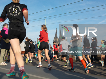 Thousands of people take part in the traditional Cologne Marathon in Cologne, Germany, on October 6, 2024. (