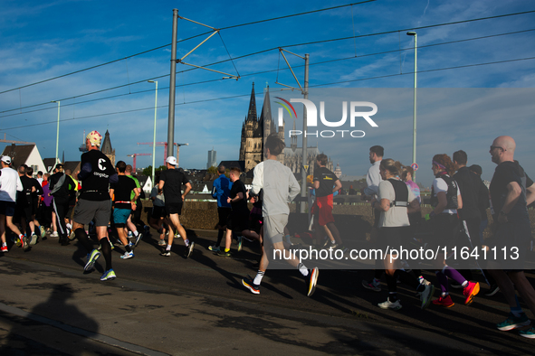 Thousands of people take part in the traditional Cologne Marathon in Cologne, Germany, on October 6, 2024. 