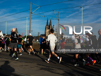 Thousands of people take part in the traditional Cologne Marathon in Cologne, Germany, on October 6, 2024. (